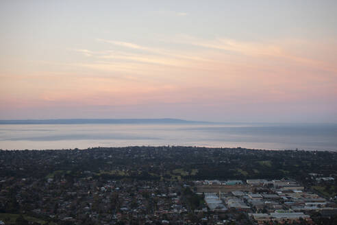 Aerial view of Port Philip Bay at sunset along the coast, Melbourne, Victoria, Australia. - AAEF21843