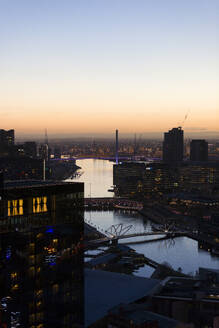 Aerial view of the Southbank district of Melbourne along the river at sunset, Victoria, Australia. - AAEF21879