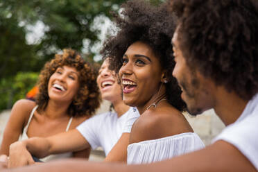 Group of afroamerican friends bonding in Manhattan, New York - Young adults having fun outdoors, concepts about lifestyle and young adult generation - DMDF02049