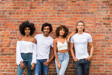 Group of afroamerican friends bonding in Manhattan, New York - Young adults having fun outdoors, concepts about lifestyle and young adult generation - DMDF02051