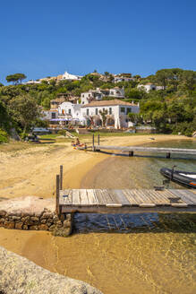 View of beach and whitewashed villas of Porto Rafael, Sardinia, Italy, Mediterranean, Europe - RHPLF26769