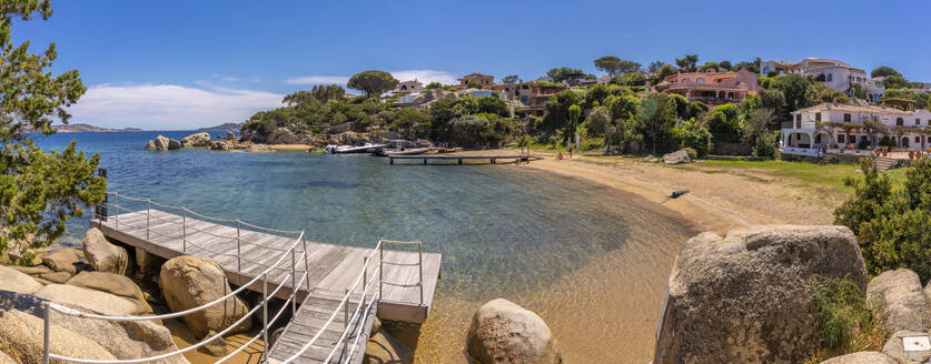 View of beach and whitewashed villas of Porto Rafael, Sardinia, Italy, Mediterranean, Europe - RHPLF26771