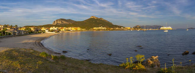 View of beach at sunset in Golfo Aranci, Sardinia, Italy, Mediterranean, Europe - RHPLF26796