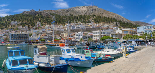 View of harbour boats in Kalimnos with hills in the background, Kalimnos, Dodecanese Islands, Greek Islands, Greece, Europe - RHPLF26819