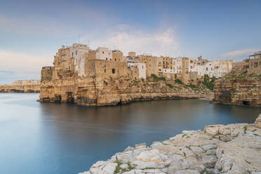 Polignano a Mare coastal town at dusk, Bari, Apulia, Adriatic Sea, Mediterranean Sea, Italy, Europe - RHPLF26926