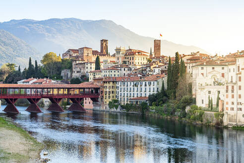 Old town of Bassano Del Grappa overlooking river Brenta at sunrise, Vicenza province, Veneto, Italy, Europe - RHPLF27011