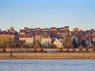 View over River Vistula towards The Old Town at sunrise, Warsaw, Masovian Voivodeship, Poland, Europe - RHPLF27100