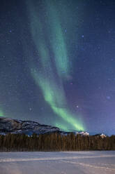Aurora Borealis (Northern Lights) over the Alta River, near Alta, Arctic Cirle, Norway, Scandinavia, Europe - RHPLF27192