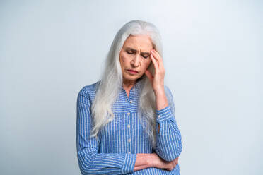 Beautiful senior woman portrait, studio shot on background - Elderly person, half body shot - DMDF02822