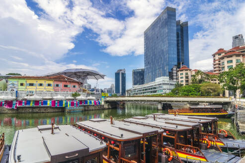 Singapore, Singapore City, Clarke Quay with moored boats in foreground - THAF03204