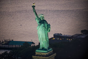 Statue of Liberty from above, New York - View of NY landmarks from helicopter tour - DMDF03603