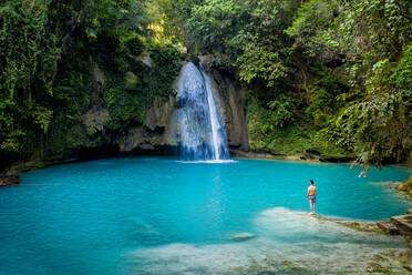 Kawasan waterfalls located on Cebu Island, Philippines - Beautiful waterfall in the jungle - DMDF03604