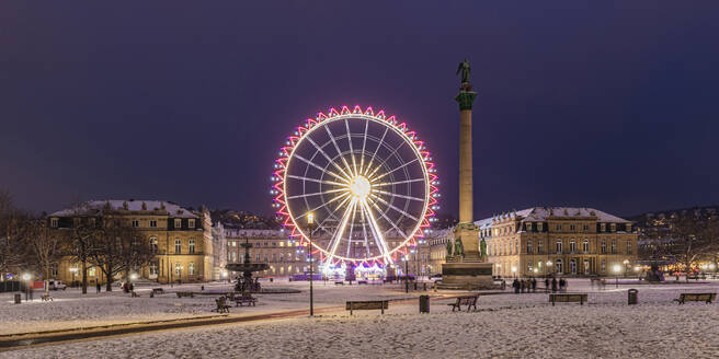 Germany, Baden-Wurttemberg, Stuttgart, Ferris wheel glowing at Schlossplatz square at night - WDF07378