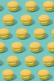 Yellow macaroons on colored background - FLMF01010