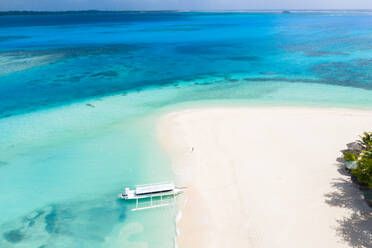 Daku Island, Siargao, Philippines - Tropical beach with blue water and palm trees - DMDF03825