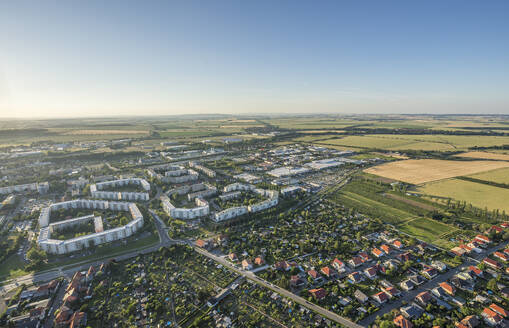 Germany, Saxony-Anhalt, Wernigerode, Aerial view of rural town with fields in background - PVCF01356