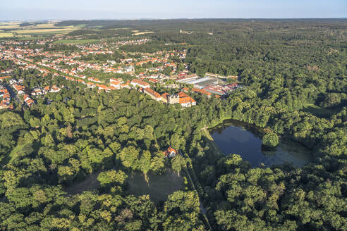 Germany, Saxony-Anhalt, Ballenstedt, Aerial view of lake in front of Ballenstedt Castle - PVCF01361