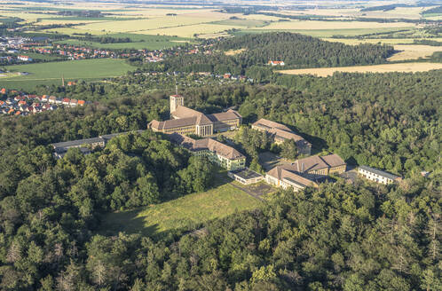 Germany, Saxony-Anhalt, Ballenstedt, Aerial view of Ziegenberg complex surrounded by green trees - PVCF01362