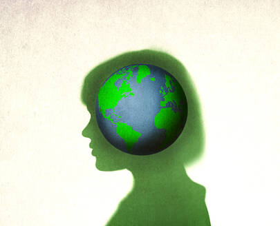 Planet Earth inside silhouette of woman - GWAF00314
