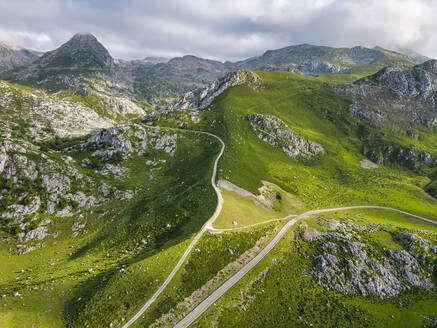 Spain, Cantabria, Aerial view of green landscape of Picos de Europa range - LAF02830