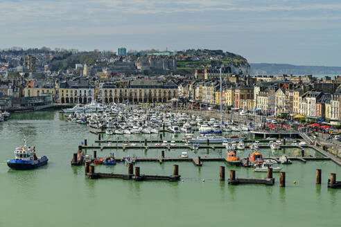 Sailboats at Dieppe harbor with city on sunny day - ANSF00595