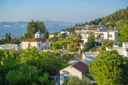 View of Greek Orthodox Church with sea in background, Zia Village, Kos Town, Kos, Dodecanese, Greek Islands, Greece, Europe - RHPLF27307