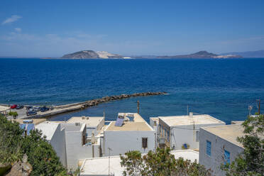 View of rooftops and the sea in the town of Mandraki, Mandraki, Nisyros, Dodecanese, Greek Islands, Greece, Europe - RHPLF27311