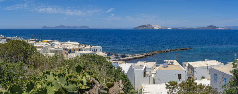 View of rooftops and the sea in the town of Mandraki, Mandraki, Nisyros, Dodecanese, Greek Islands, Greece, Europe - RHPLF27314