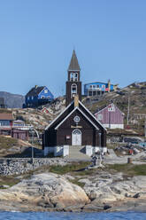 A view of the colorful town of Ilulissat, formerly Jakobshavn, Western Greenland, Polar Regions - RHPLF27347