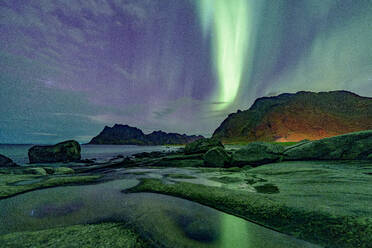 Uttakleiv beach under the multicolored sky during the Aurora Borealis (Northern Lights), Vestvagoy, Lofoten Islands, Nordland, Norway, Scandinavia, Europe - RHPLF27355