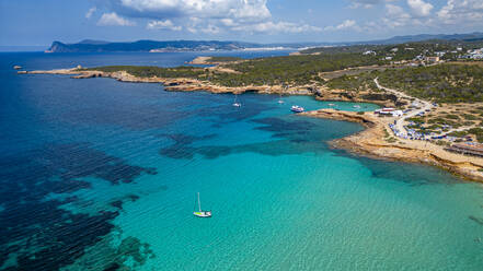 Aerial of Comte beach with its turquoise waters, Ibiza, Balearic Islands, Spain, Mediterranean, Europe - RHPLF27386
