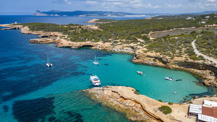 Aerial of Comte beach with its turquoise waters, Ibiza, Balearic Islands, Spain, Mediterranean, Europe - RHPLF27387