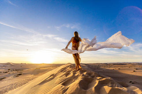 Ethereal woman at the Imperial Sand Dunes, California, United States of America, North America - RHPLF27473