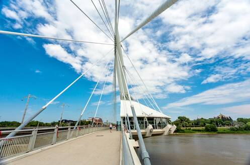The Esplanade Riel suspended pedestrian footbridge over the Red River, completed 2003, linking central Winnipeg to St. Boniface district, Winnipeg, Manitoba, Canada, North America - RHPLF27500