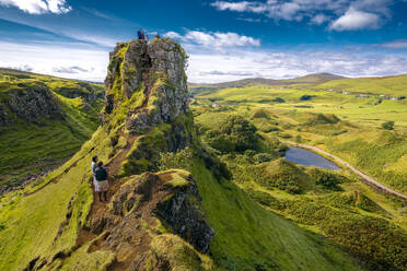 Tourists explore Fairy Glenn, Isle of Skye, Inner Hebrides, Scotland, United Kingdom, Europe - RHPLF27533