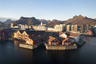 Fishing village and town of Svolvaer at sunrise in autumn, aerial view, Lofoten Islands, Nordland, Norway, Scandinavia, Europe - RHPLF27583