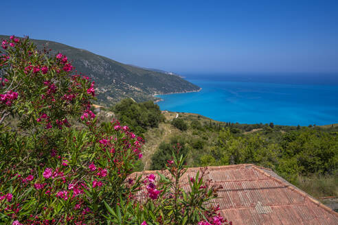View of houses overlooking coastline, sea and hills near Agkonas, Kefalonia, Ionian Islands, Greek Islands, Greece, Europe - RHPLF27881