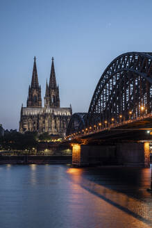 Cologne Cathedral, UNESCO World Heritage Site, and Hohenzollern Bridge at dusk, Cologne, North Rhine-Westphalia, Germany, Europe - RHPLF27895