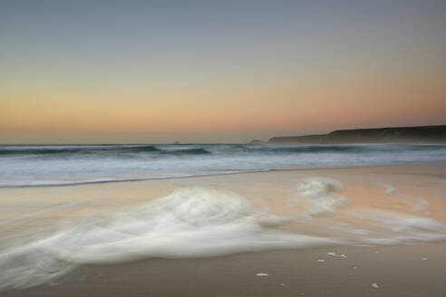 Atlantic shoreline at sunset, Whitesand Bay, Sennen Cove, near Land's End, in the far west of Cornwall, England, United Kingdom, Europe - RHPLF27949