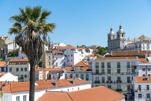 Portugal, Lisbon District, Lisbon, Apartment buildings with Monastery of Sao Vicente de Fora in background - EGBF00932