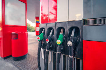 Green and black fuel gasoline dispenser at fuel pump station - ADSF47159