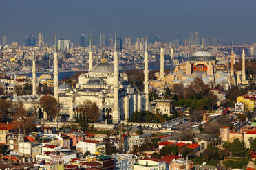 Aerial view of Blue Mosque, Hagia Sophia and highrise buildings, Istanbul, Turkey. - AAEF21916