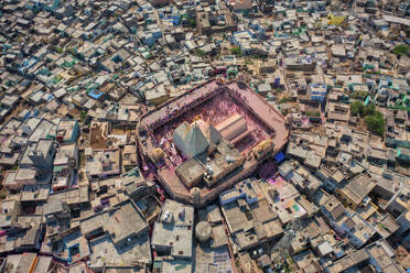 Aerial view of people celebrating the holy colour festival near the Shri And Baba Temple, Uttar Pradesh, India. - AAEF21929