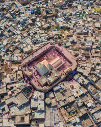 Aerial view of people celebrating the holy colour festival near the Shri And Baba Temple, Uttar Pradesh, India. - AAEF21930