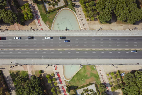Aerial view of Arago Bridge with cars on the road, Turia Park, Valencia, Spain. - AAEF22070