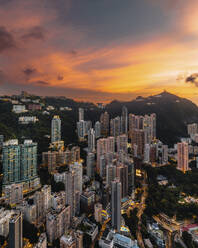 Aerial view of Hong Kong skyline with financial area skyscrapers at sunset. - AAEF22185