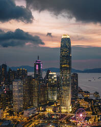 Aerial view of Hong Kong skyline with financial area skyscrapers at sunset. - AAEF22187