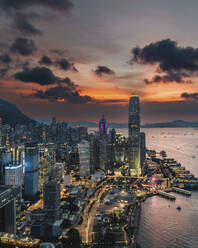 Aerial view of Hong Kong skyline with financial area skyscrapers at sunset. - AAEF22193
