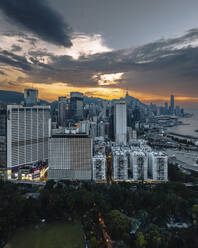 Aerial view of Hong Kong skyline with financial area skyscrapers at sunset. - AAEF22198
