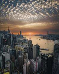 Aerial view of Hong Kong skyline with financial area skyscrapers at sunset. - AAEF22201